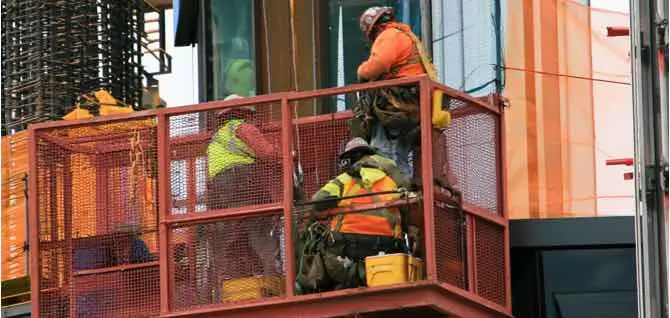 Worker using industrial equipment