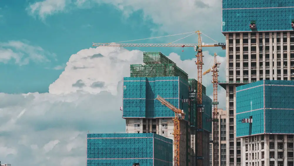 Workers and elevated equipment at a New York construction site